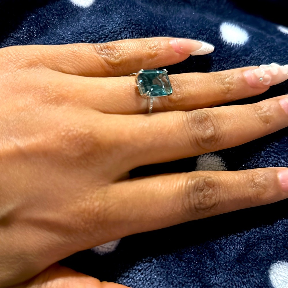 Selling Authentic EFFY blue topaz and diamond ring in a size 5 1/2.
